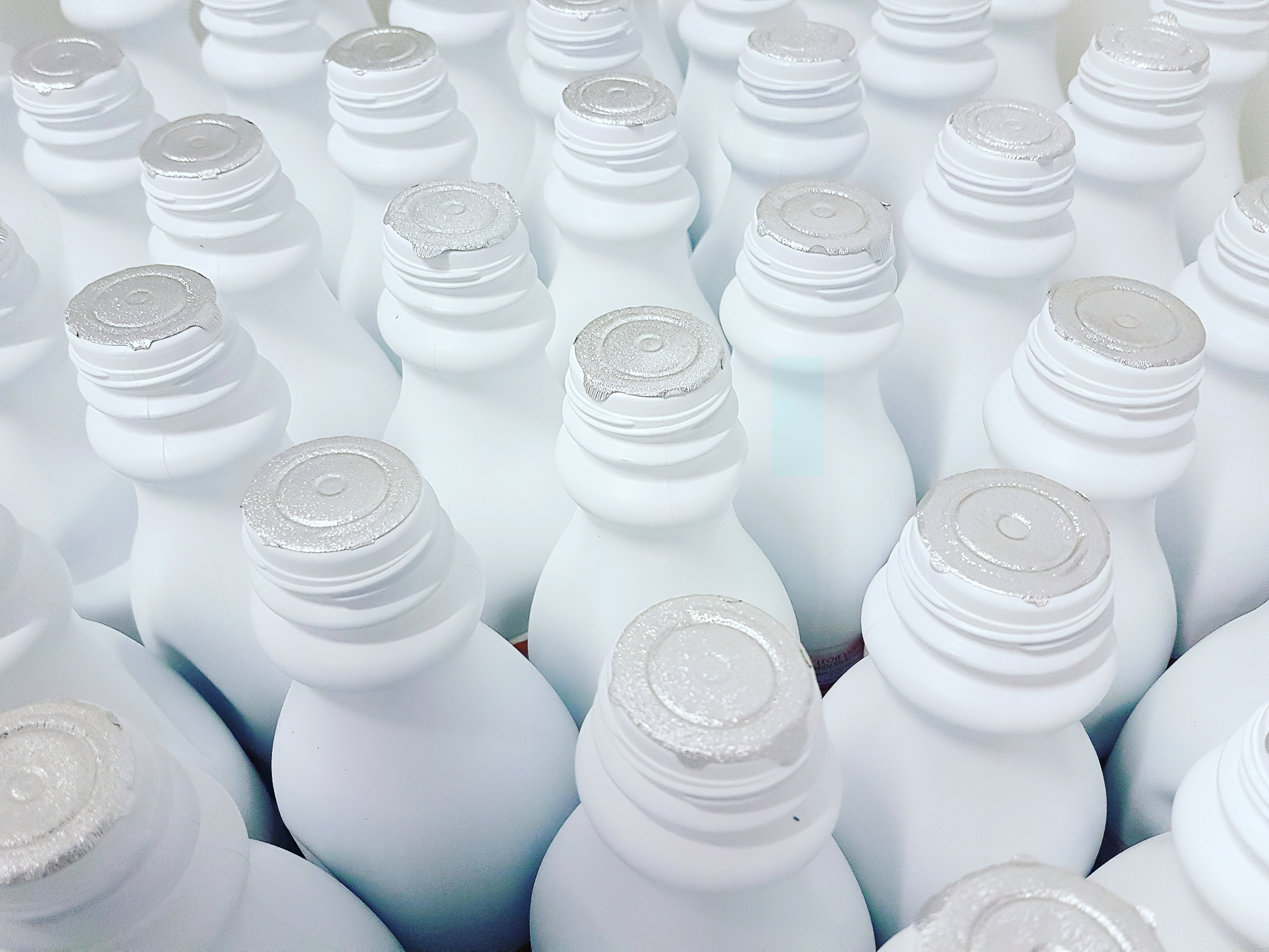milk bottle examples using induction sealer machines